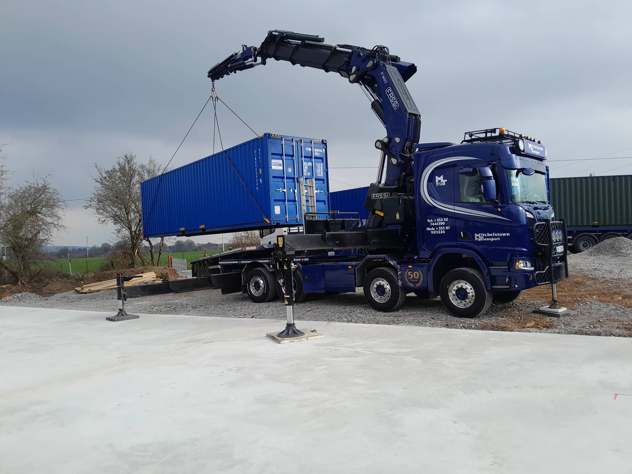 Truck container being lifted off a truck