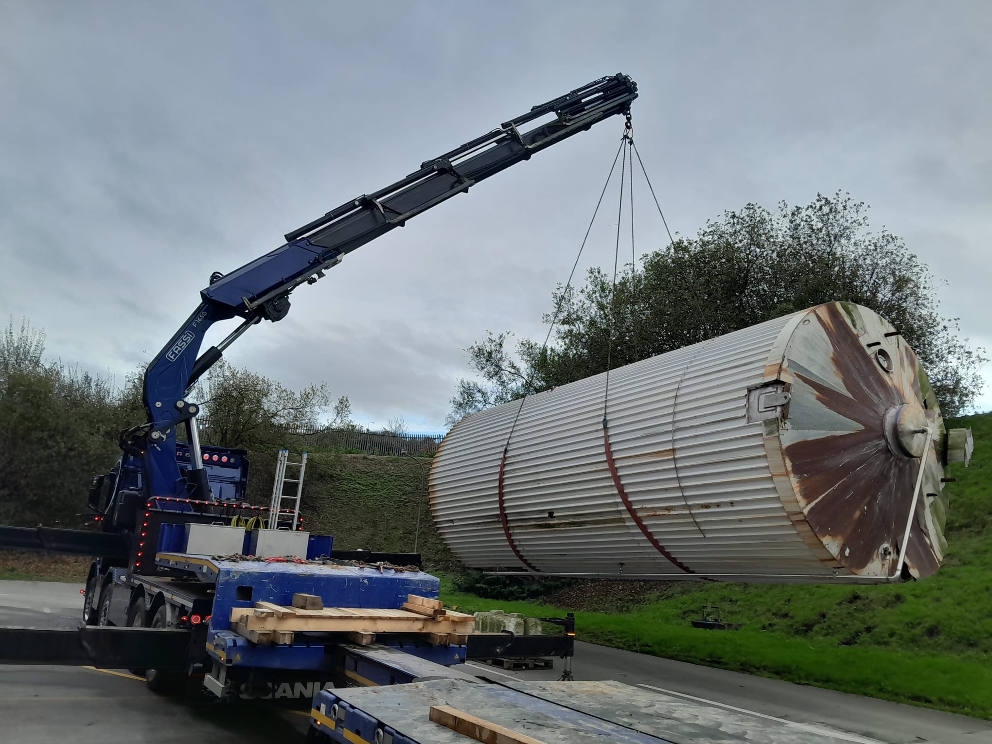 waste being collected and loaded onto a truck